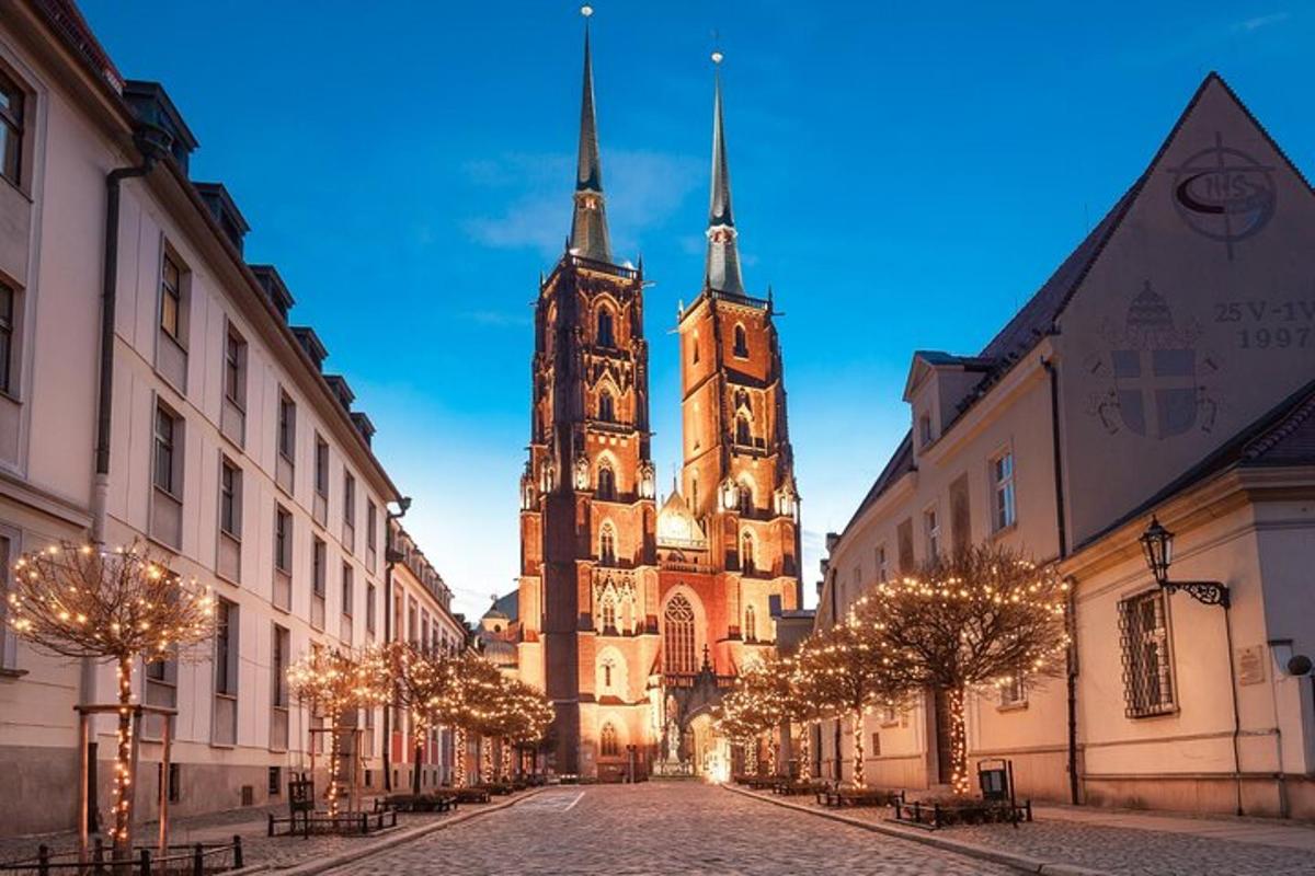 a large church with two towers on a street
