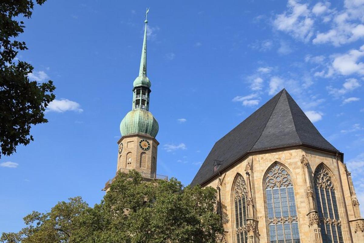 a church with a clock tower on top of it