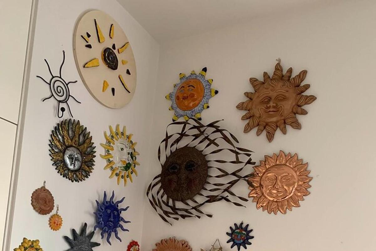 a wall with many different types of clocks on it