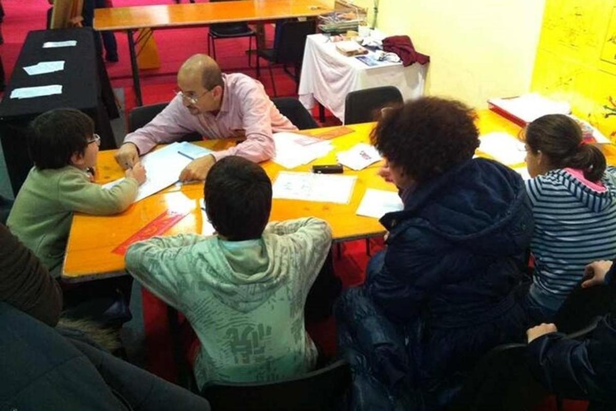 a group of people sitting around a table