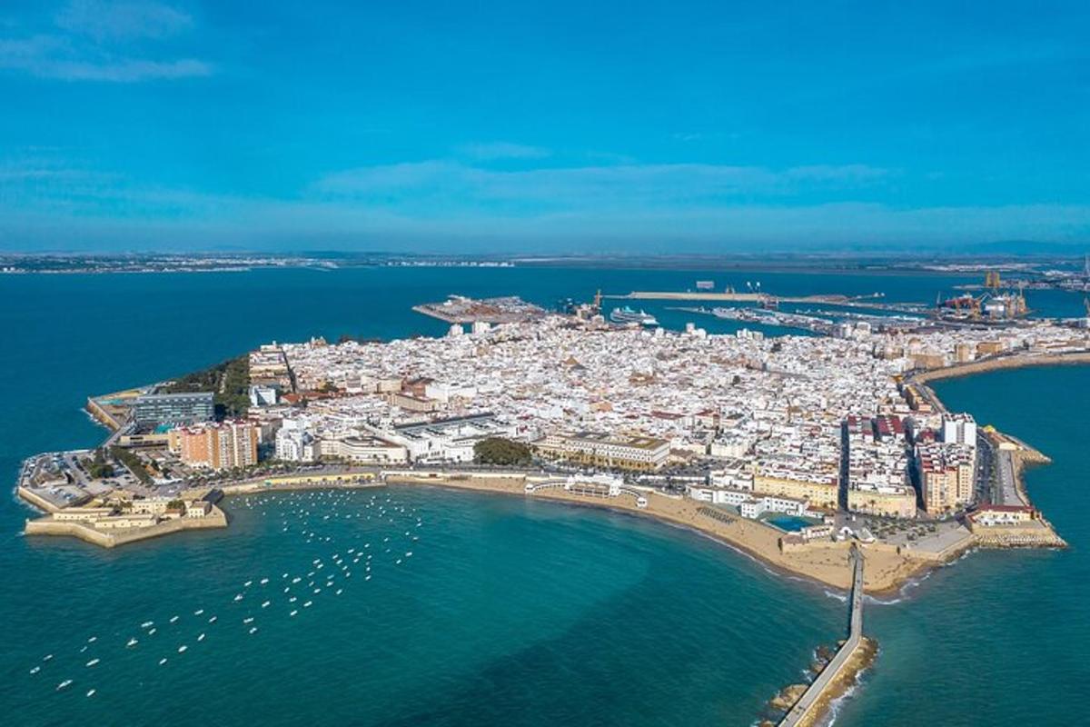 an aerial view of a city on the water