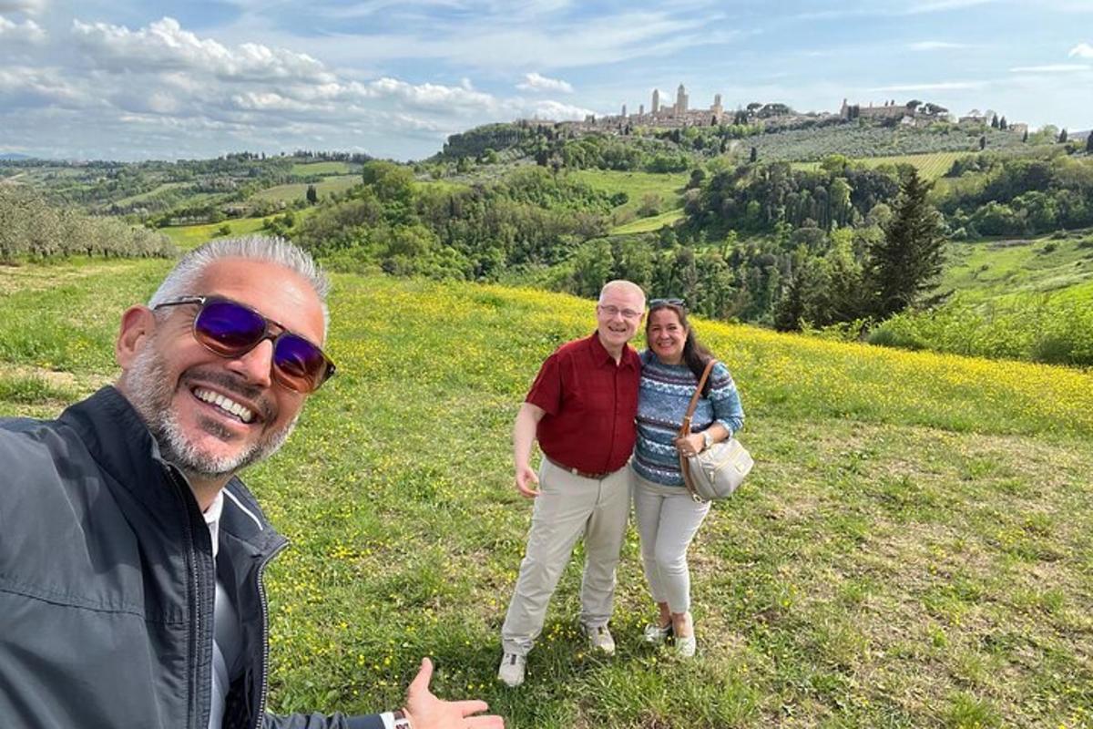 a man and a woman standing in a field