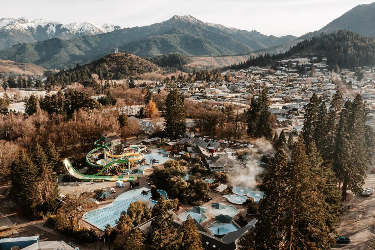an aerial view of a water park in the mountains