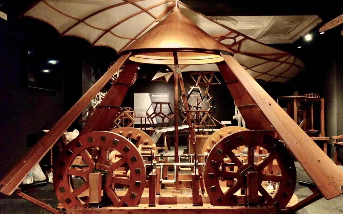 a exhibit of a wooden wagon with wooden wheels