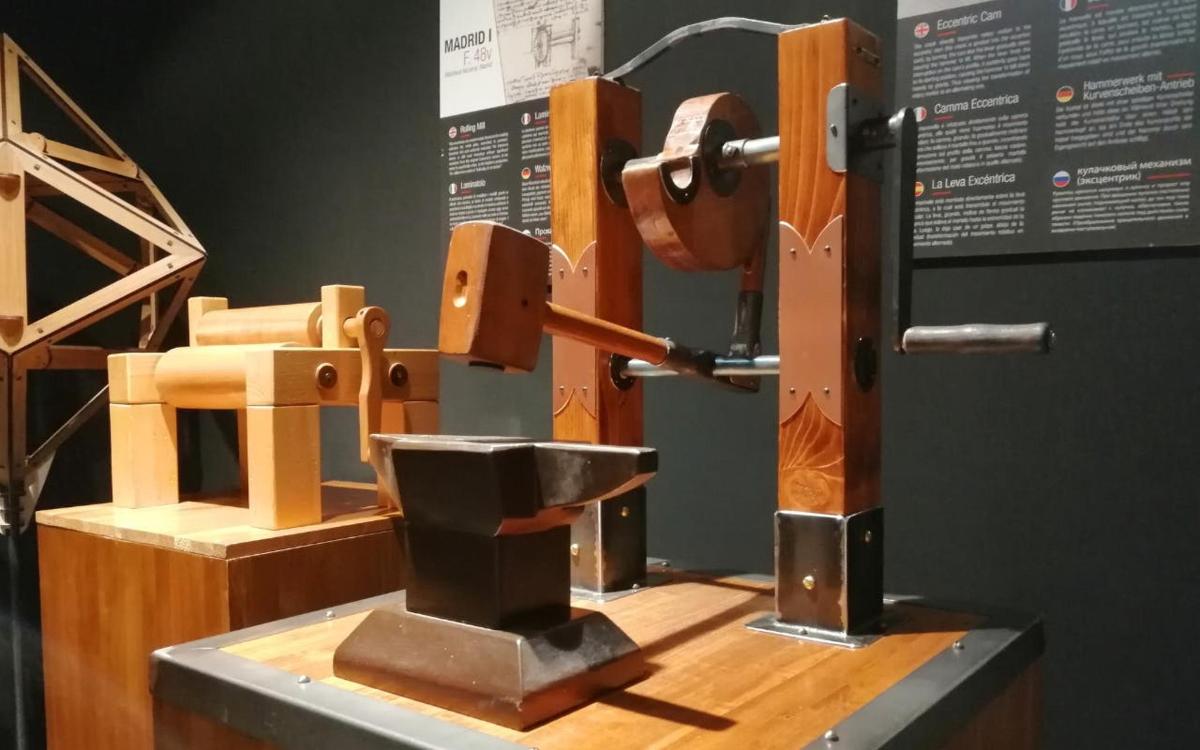 a wooden machine on display in a museum