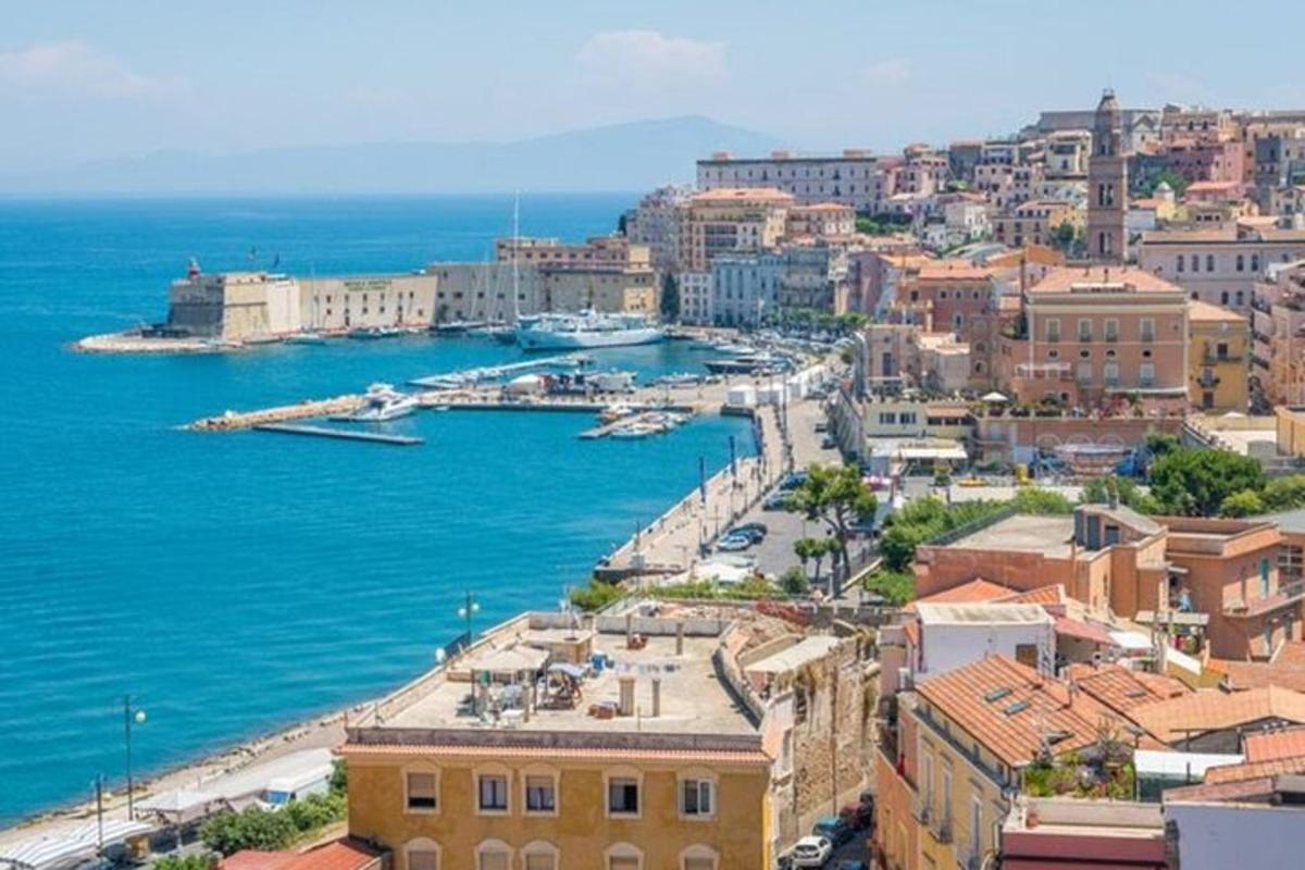 an aerial view of a city with a harbor