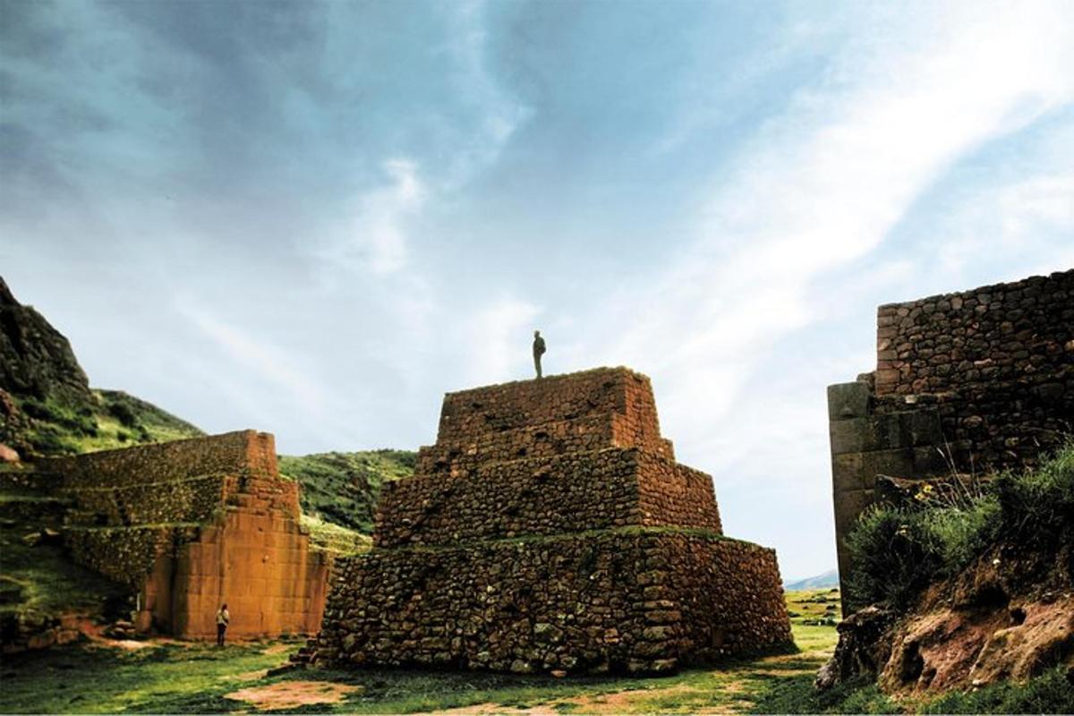 a person standing on top of a pyramid