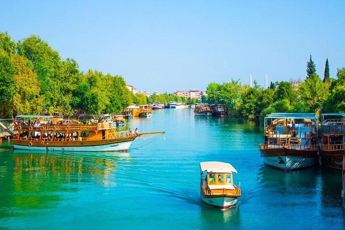 a group of boats docked in a river