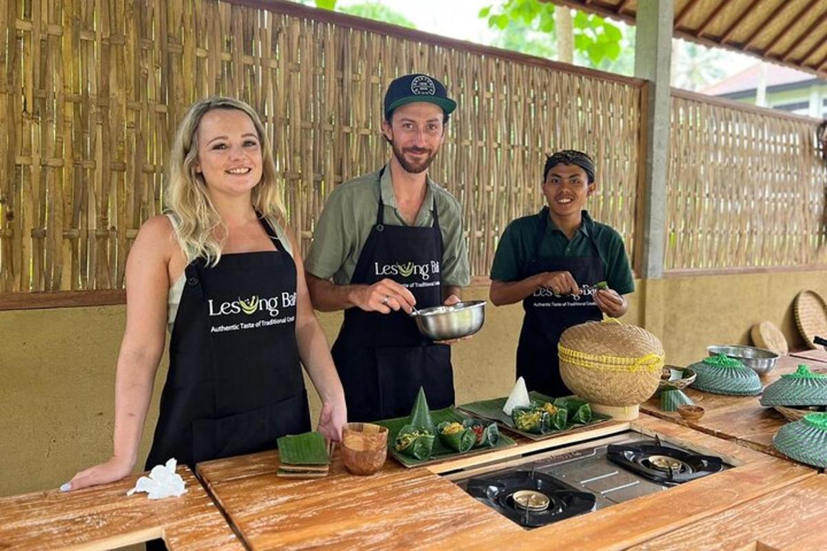 a group of people in a kitchen preparing food