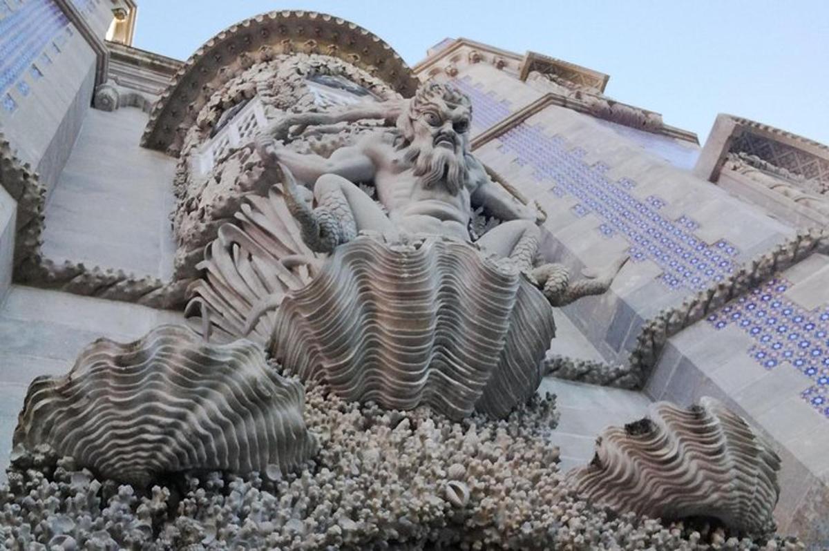 a statue on the side of a building
