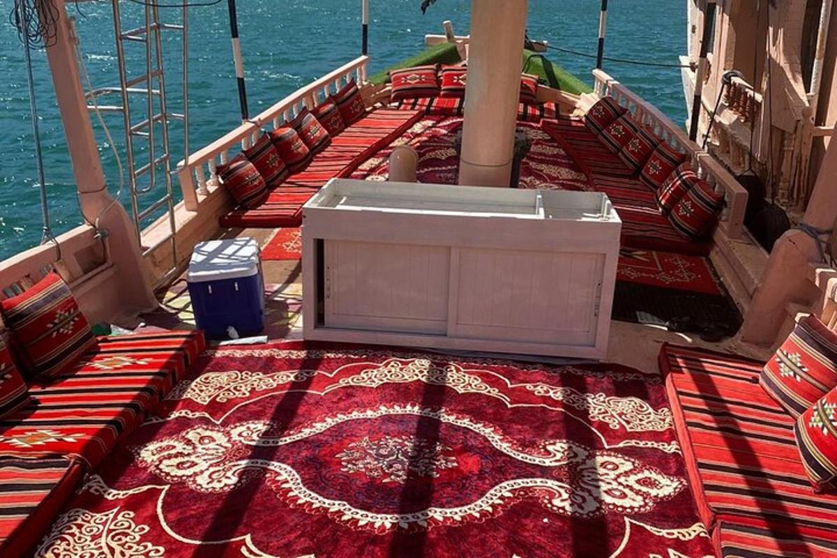 a balcony on a cruise ship with tables and chairs
