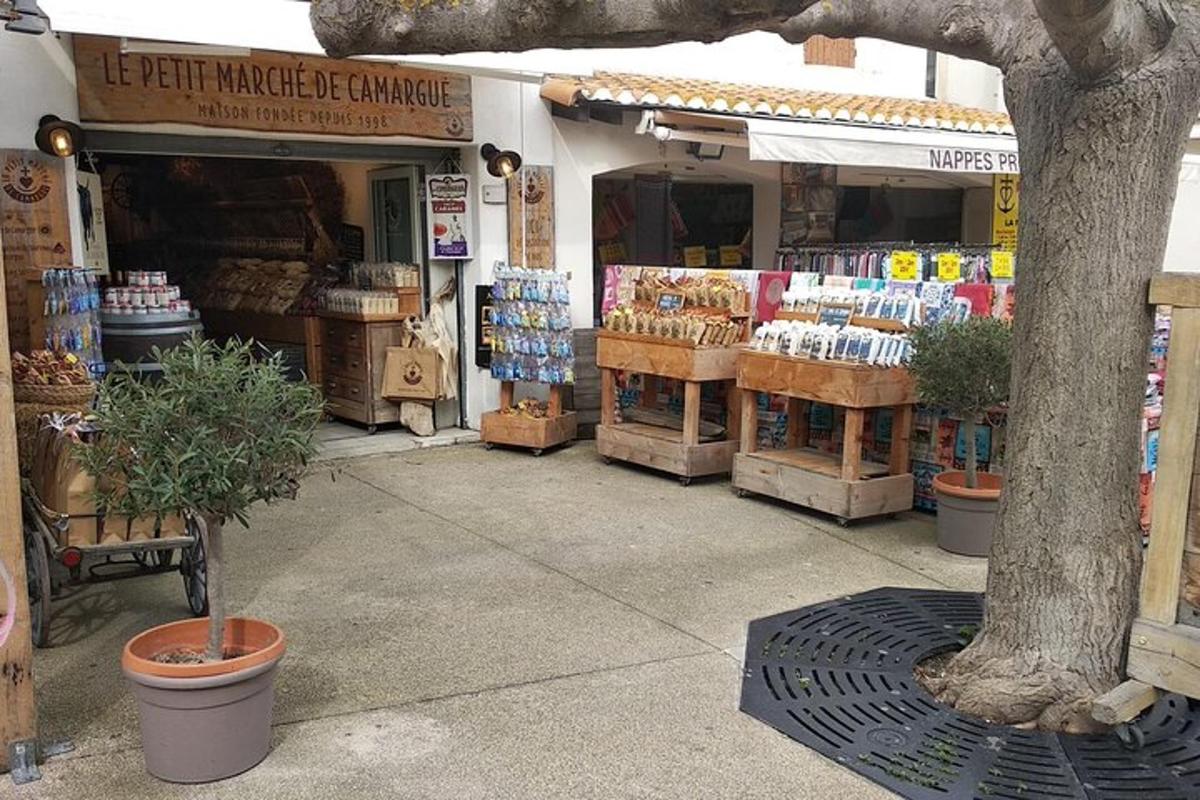 a store with a tree in front of it