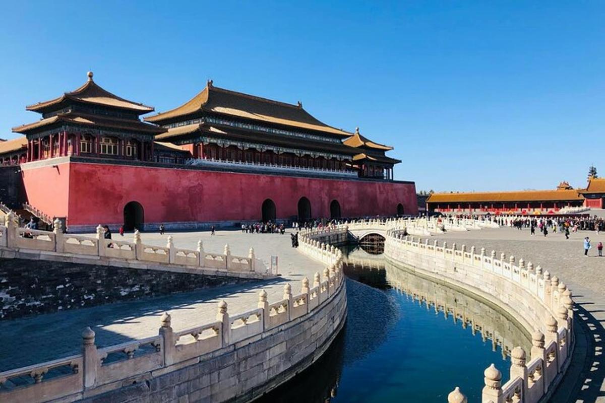 a large building with a river in front of it