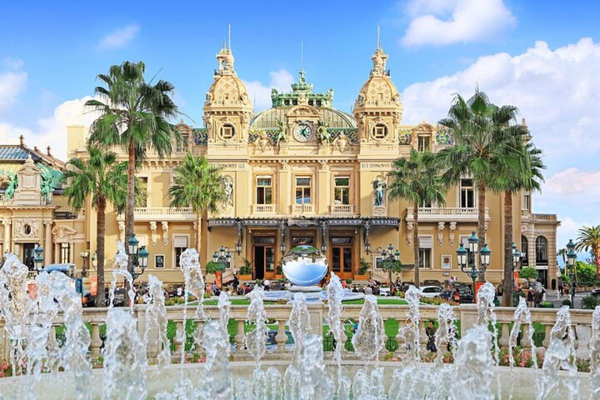 a building with a fountain in front of a building