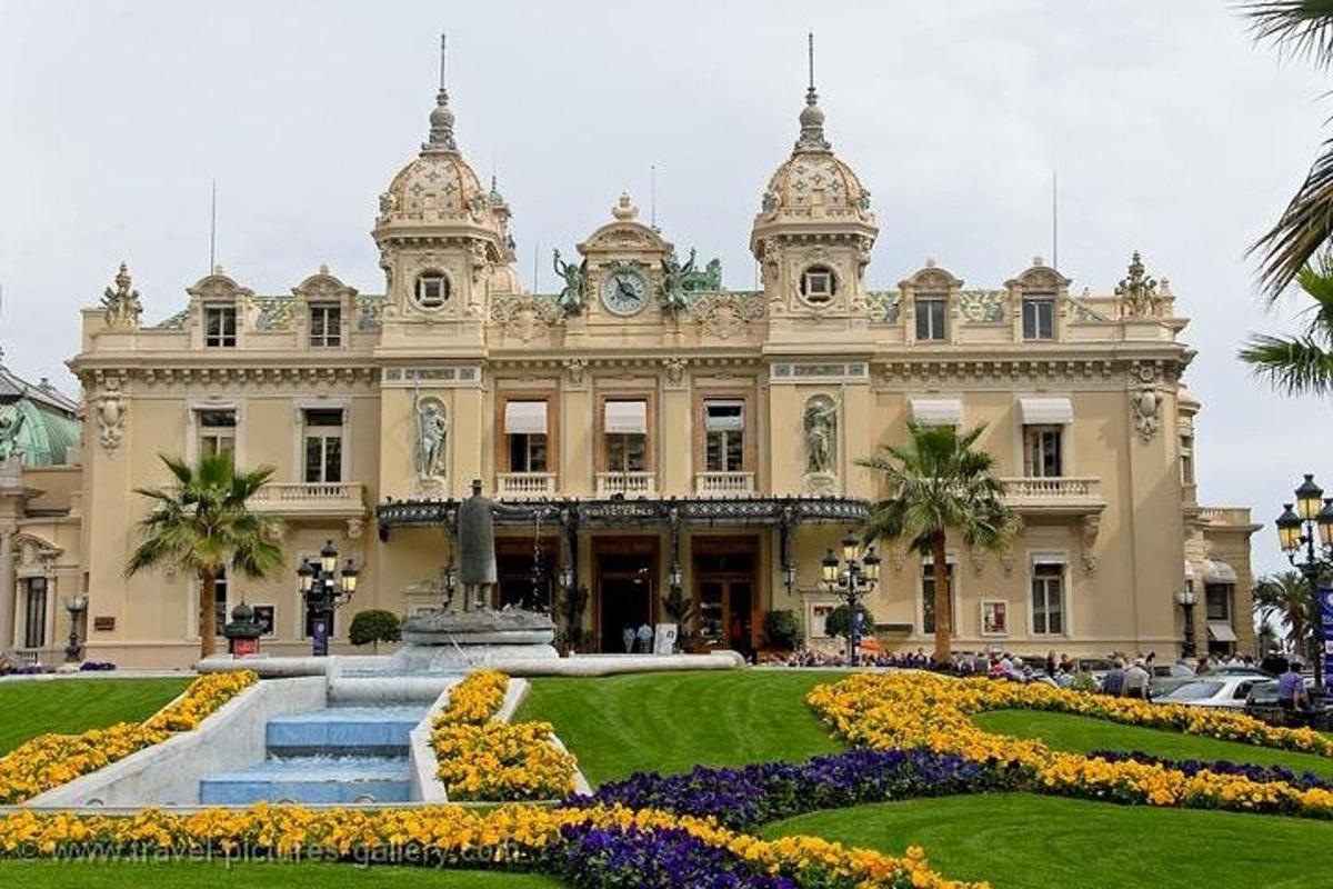 a large building with a garden in front of it