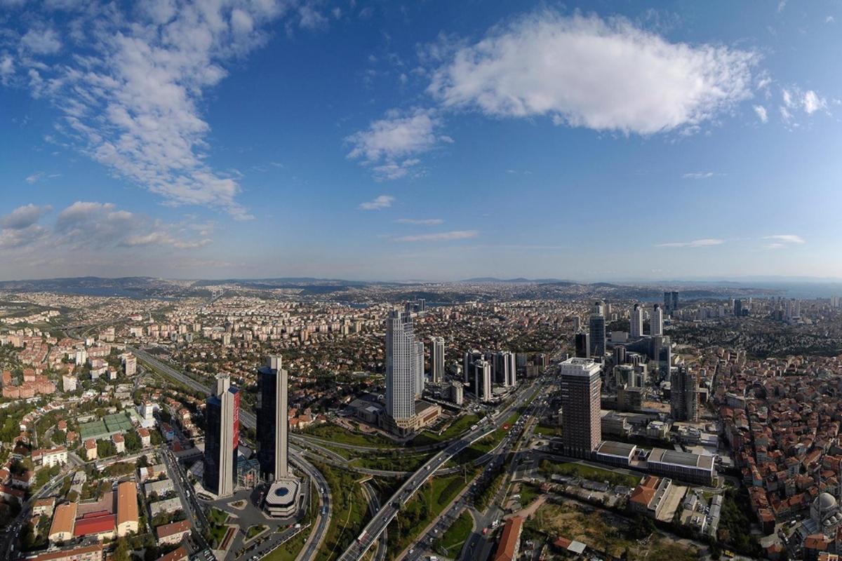an aerial view of a city with many buildings
