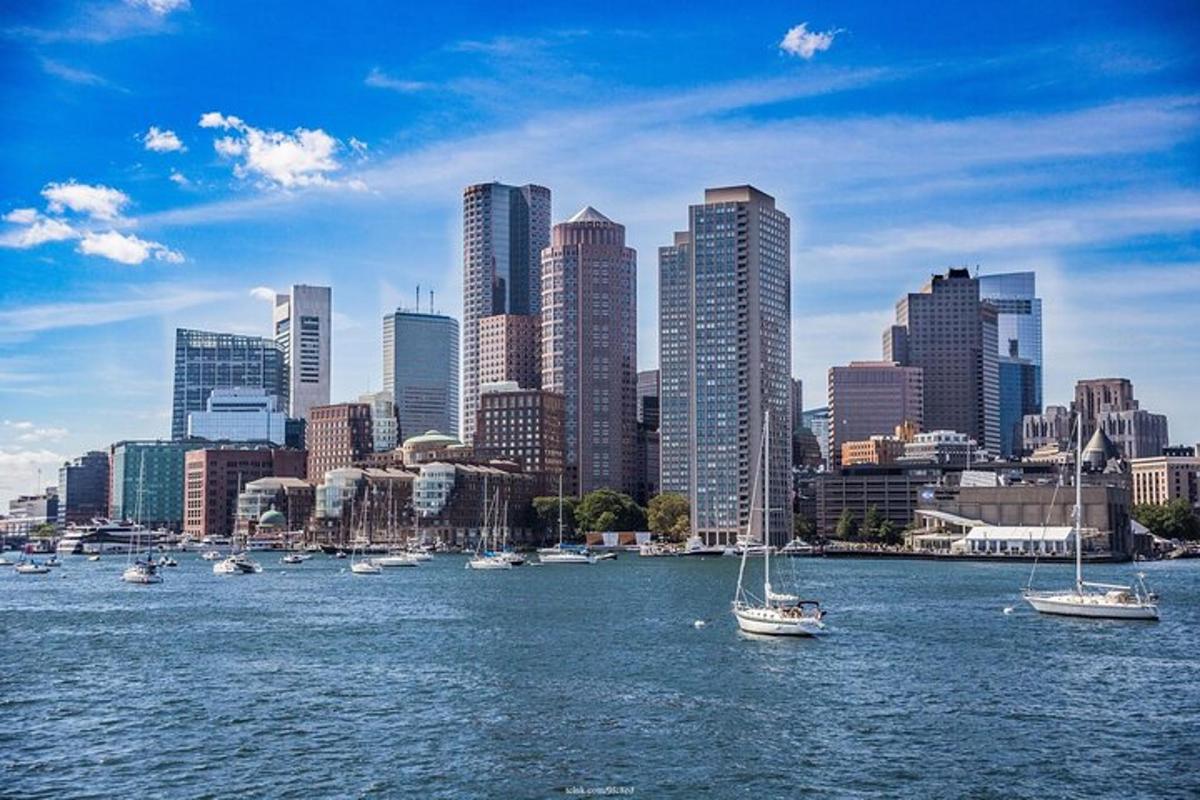 a view of a city with boats in the water