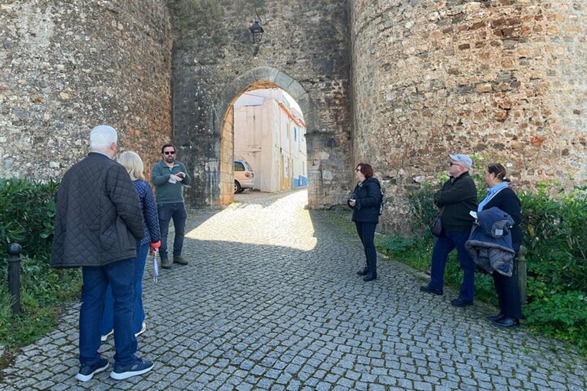 a group of people standing outside of a building