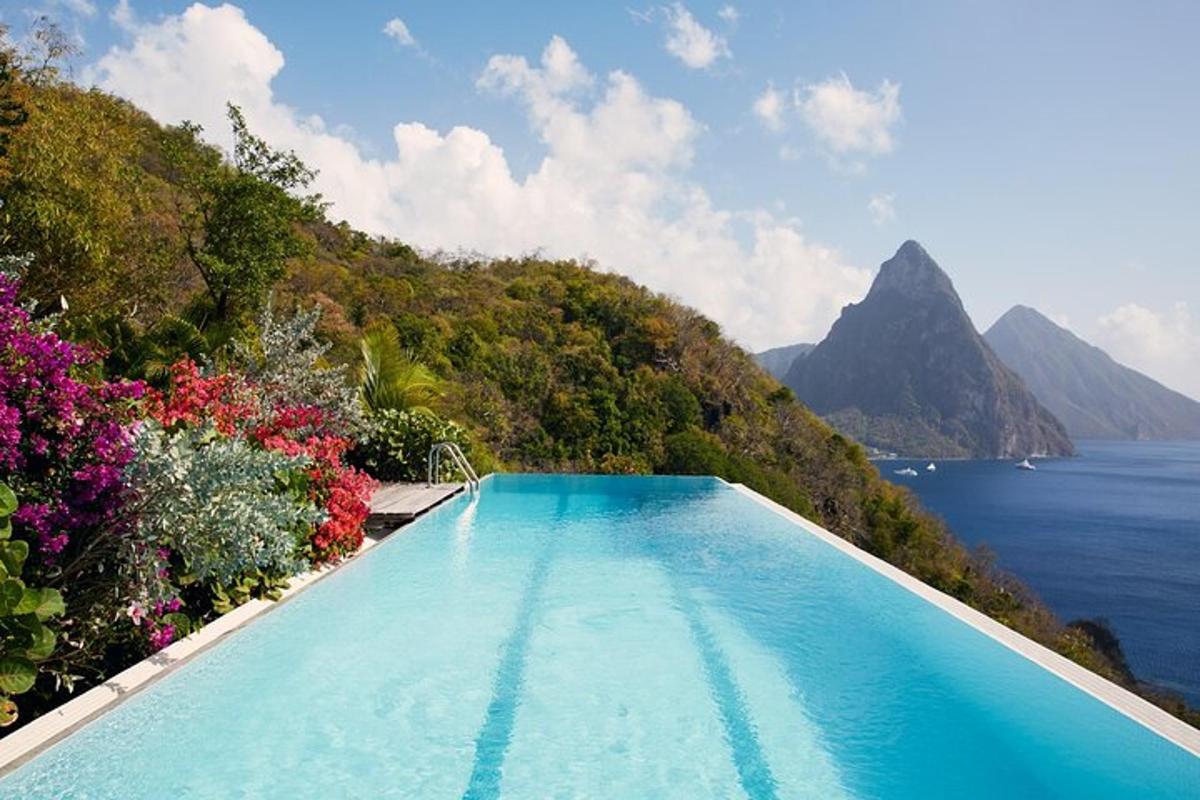 a swimming pool with a view of the ocean