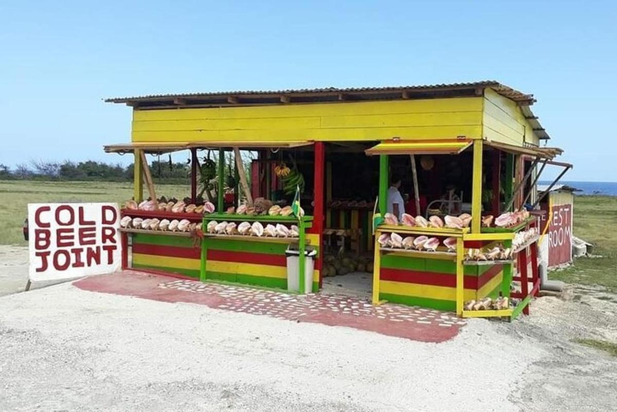דוכן פירות וירקות עם שלט מלפנים