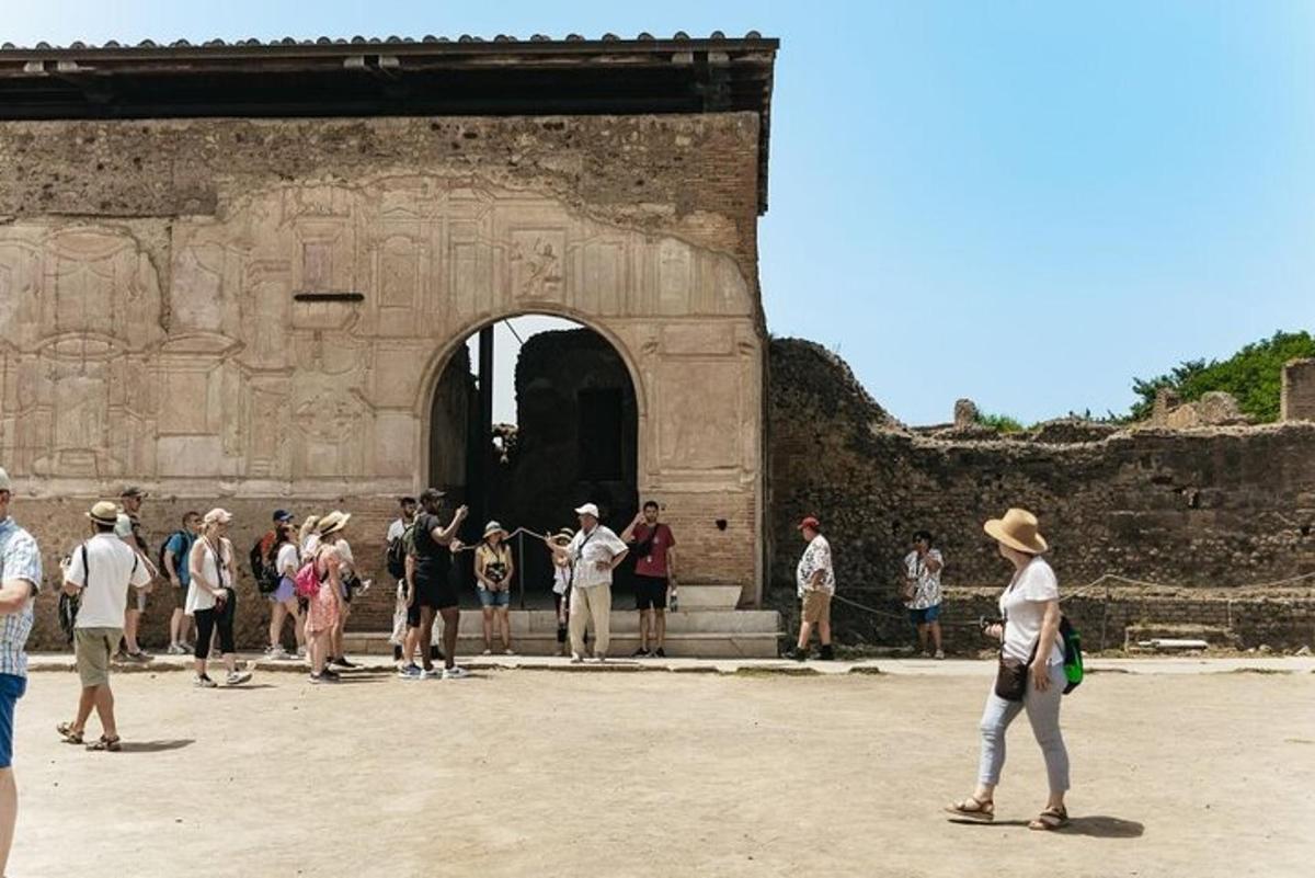 a group of people standing outside of a building