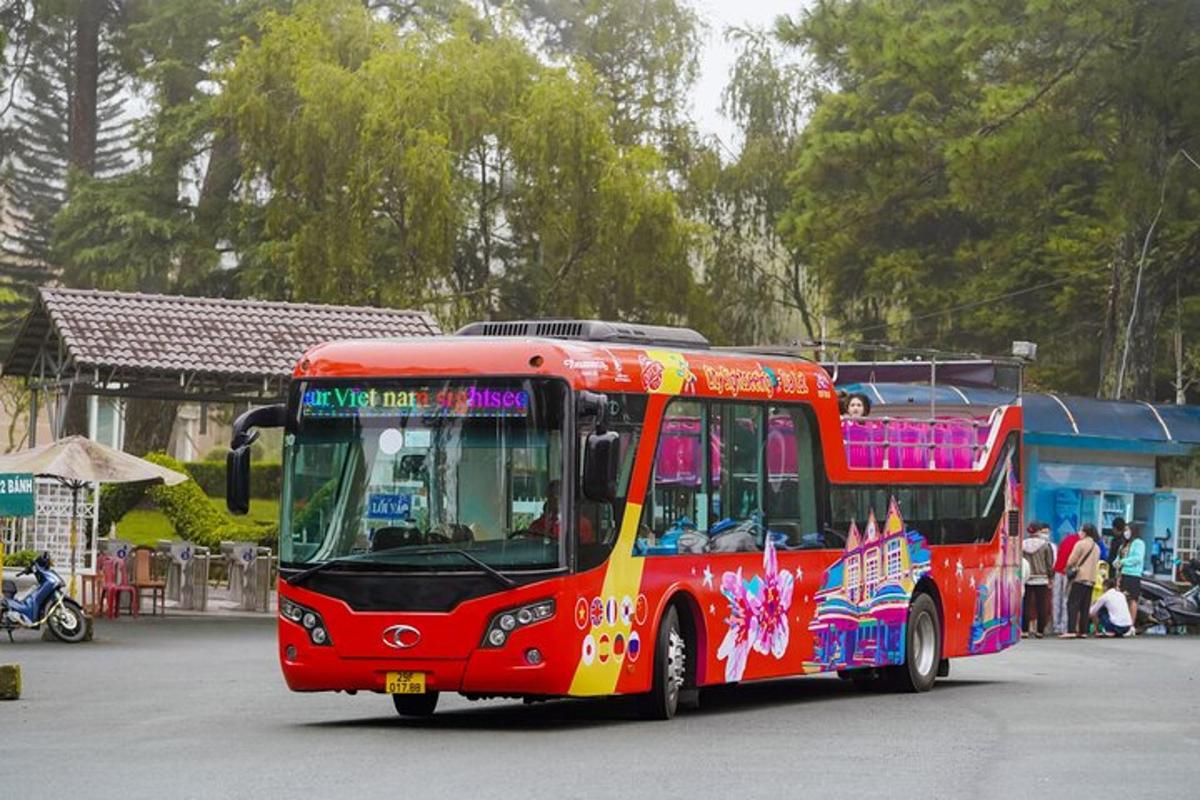 a red bus is driving down the street