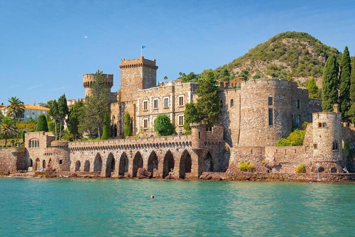 a castle on the shore of a body of water