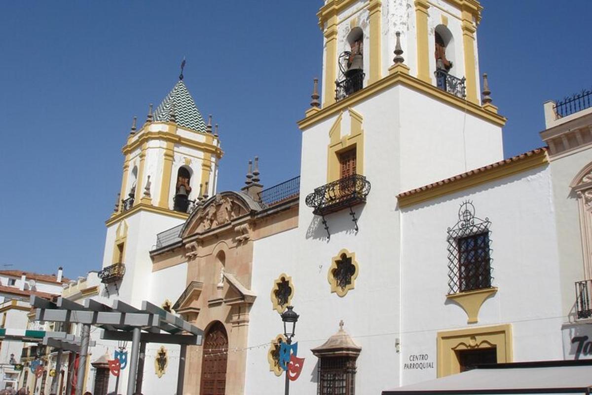 a building with a clock tower and a church