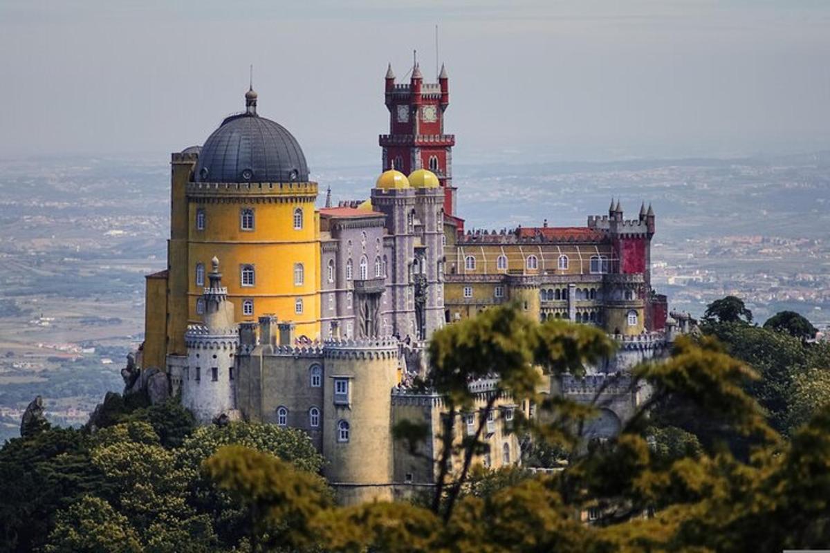 a castle sitting on top of a mountain