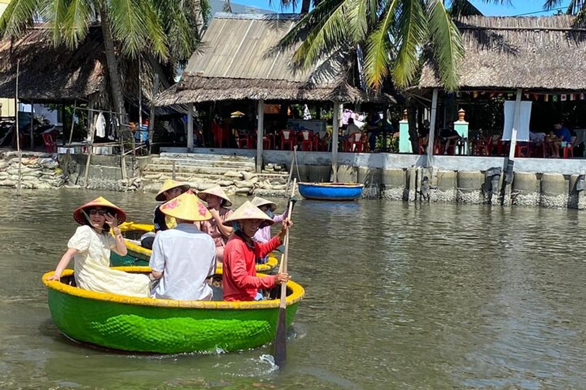 a group of people in a boat in the water