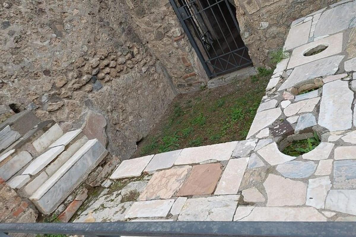 an overhead view of a stone building with a window