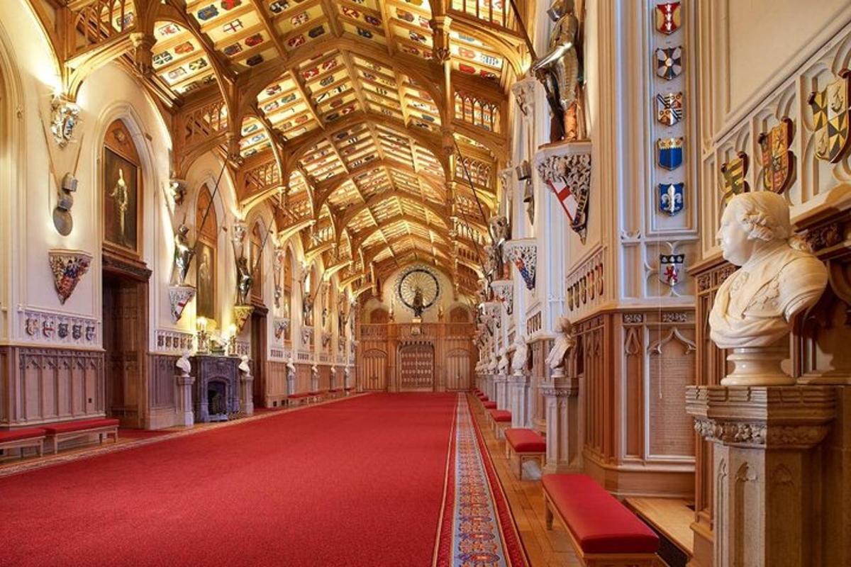 a large room with a red carpet and a large ceiling
