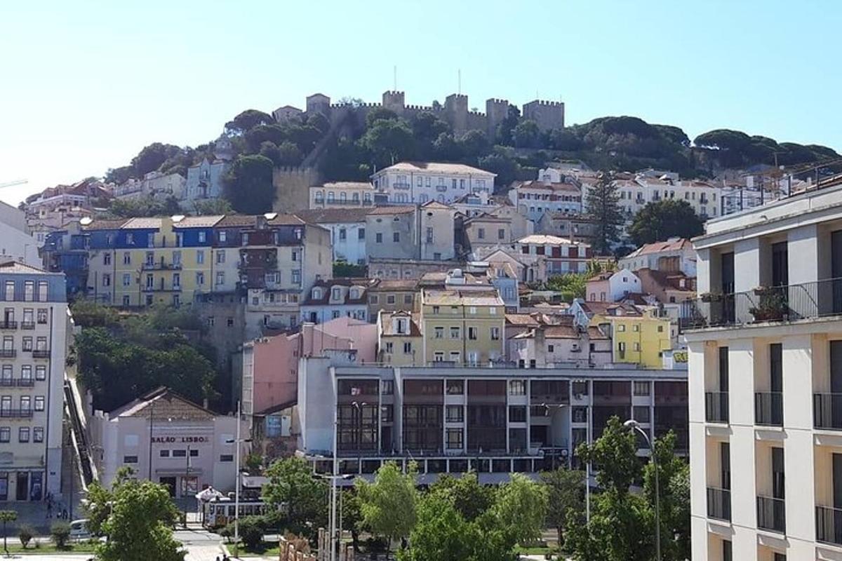 a view of a city with buildings on a hill