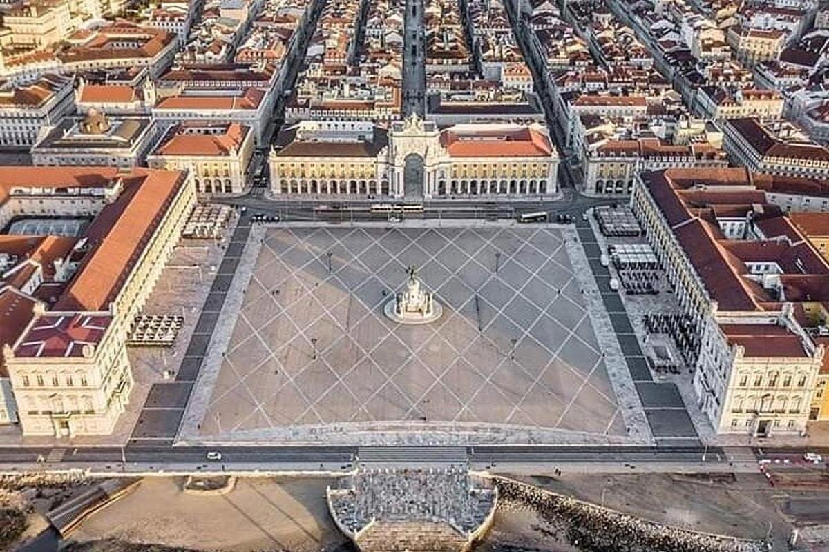an aerial view of a large square in a city