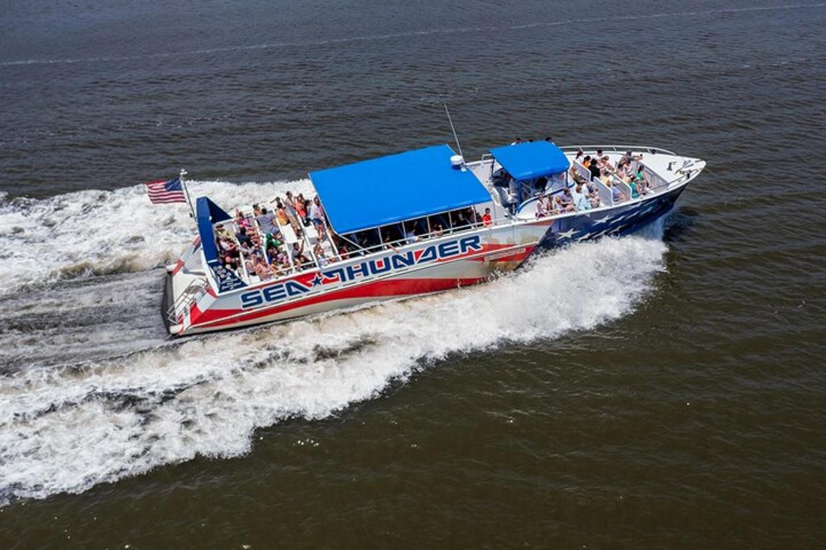 a group of people on a boat in the water