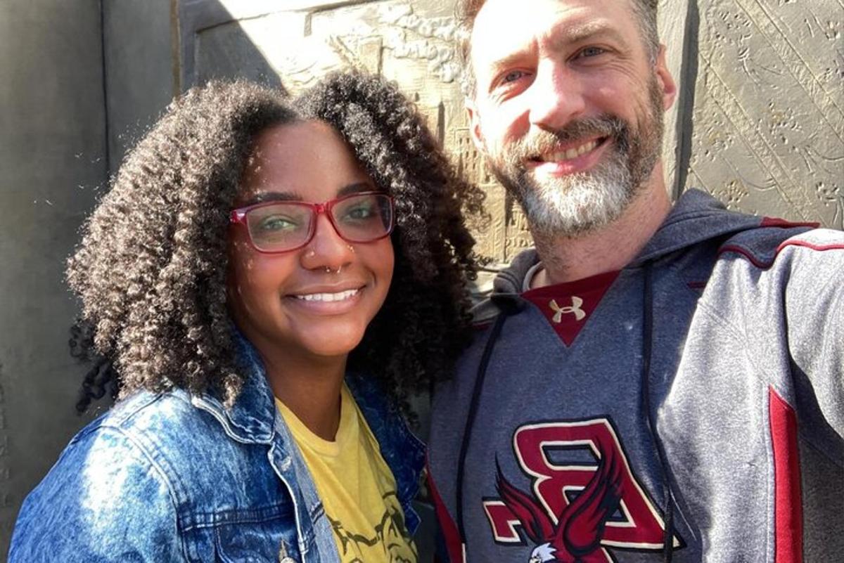 a man and a woman posing for a picture