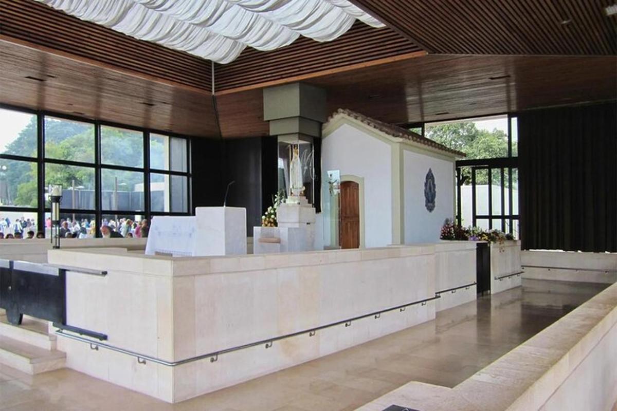 a large lobby with a counter in a building