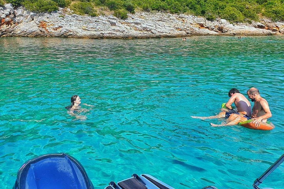 a group of people playing in the water