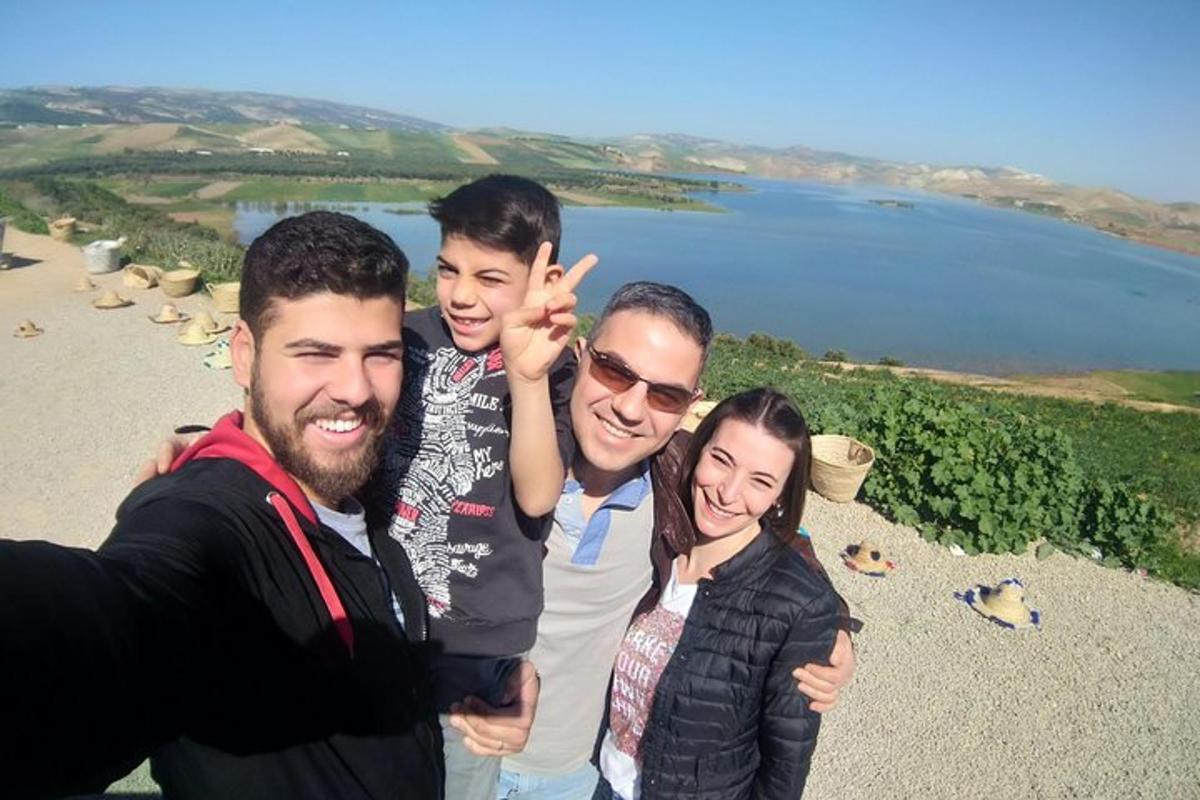 a group of three people posing for a picture