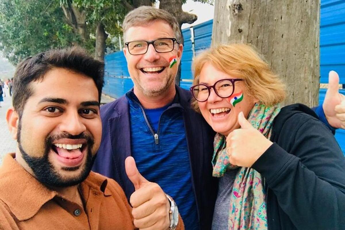 a group of three people giving the thumbs up