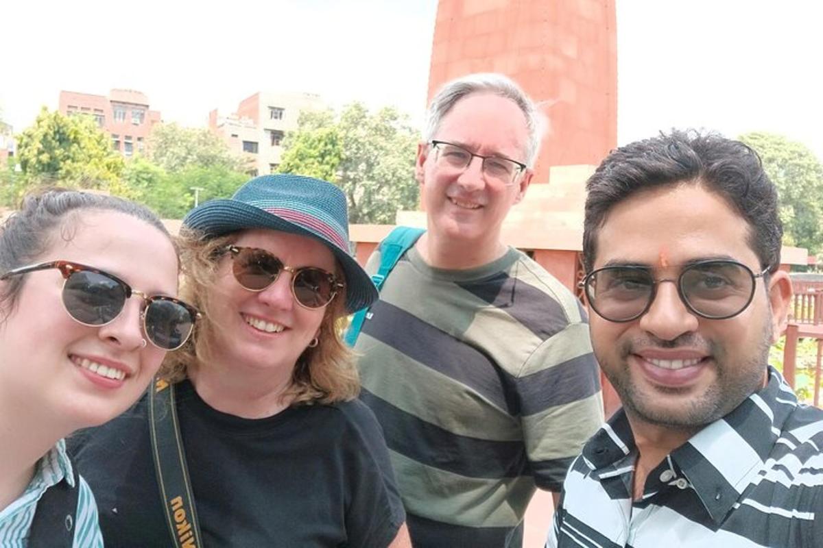 a group of three people posing for a picture