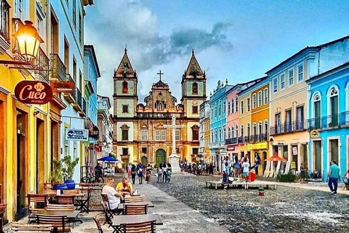 a city street with a clock tower in the distance