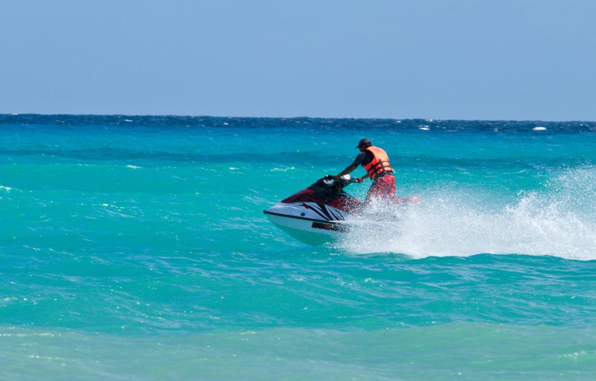 a man riding a jet ski in the water