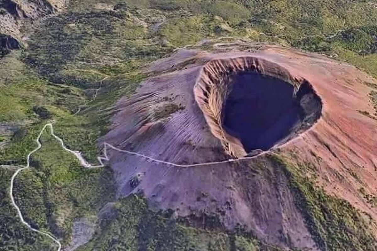 an aerial view of a crater on a mountain