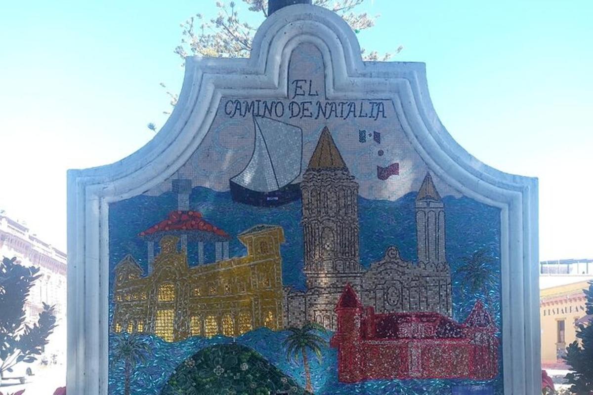a sign with a picture of cities on it