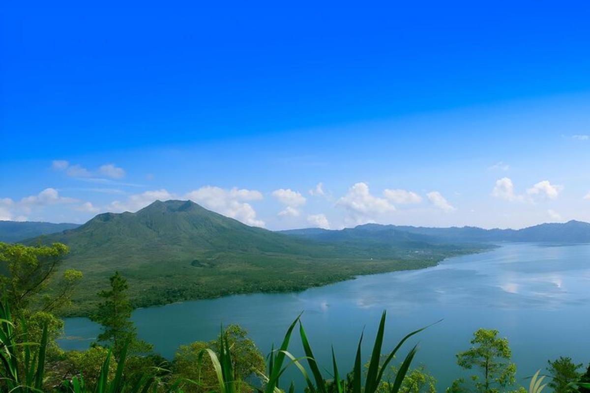 a view of a lake with mountains in the background