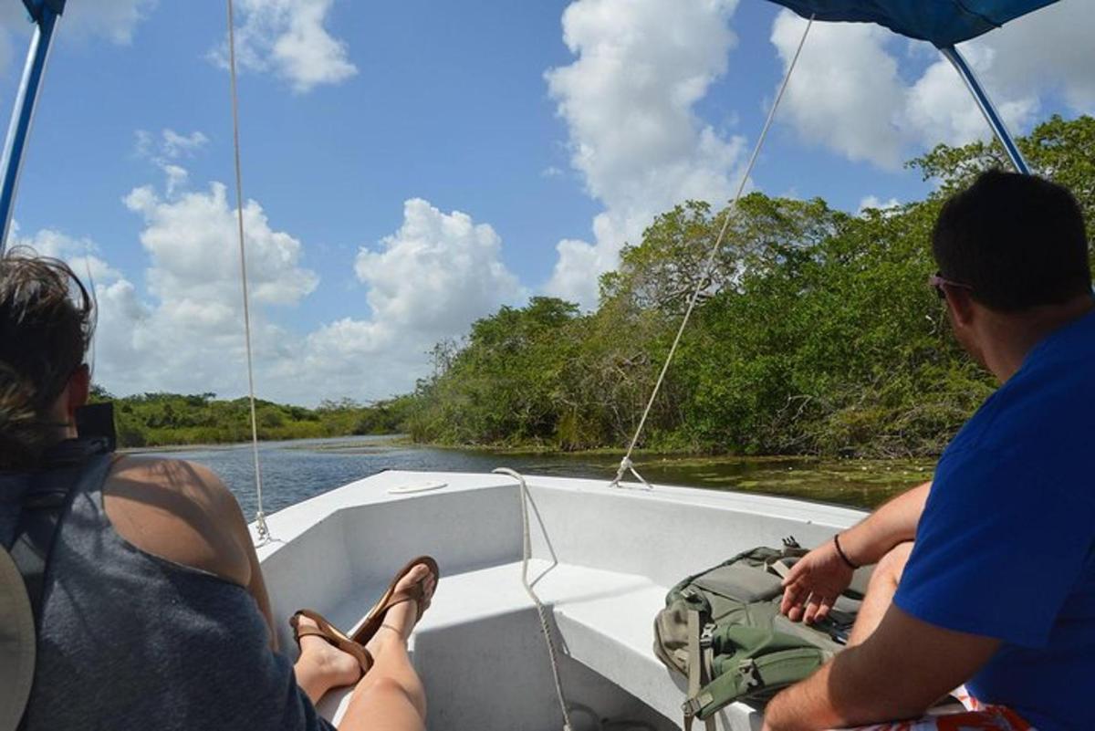 a group of people on a boat on a river