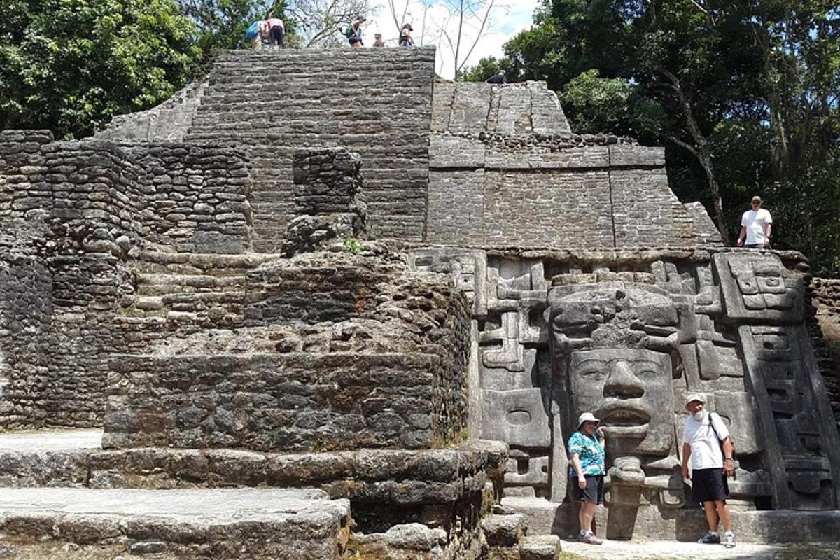 a group of people standing on top of a temple