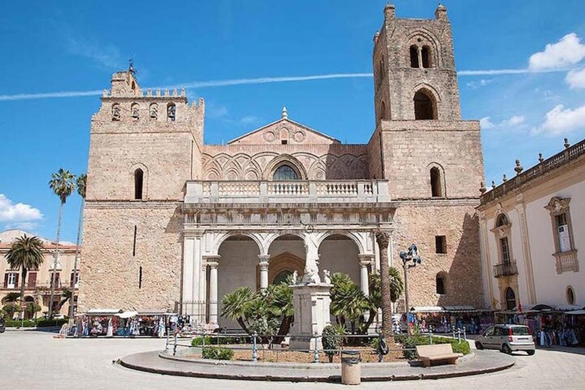 a large building with a tower and a church