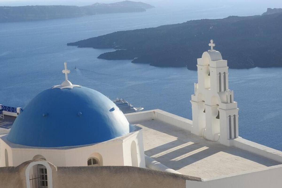 a building with a blue dome and a church